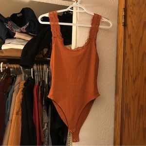 NWT burnt orange lace tank bodysuit